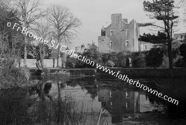 HOWTH CASTLE  LUTYEN'S TOWER (1911) AND STABLES FROM POND